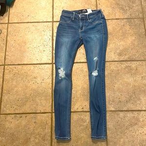 size 25 width 26 length never worn holister ripped skinned